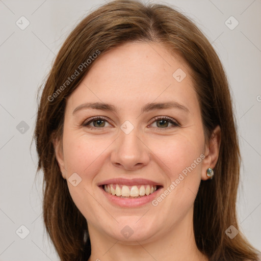 Joyful white young-adult female with long  brown hair and green eyes