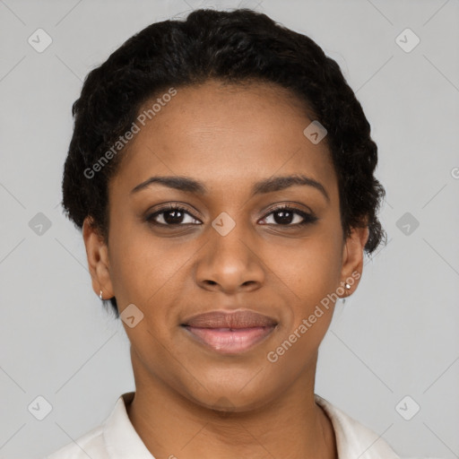 Joyful black young-adult female with short  black hair and brown eyes