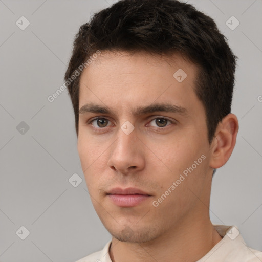 Neutral white young-adult male with short  brown hair and brown eyes