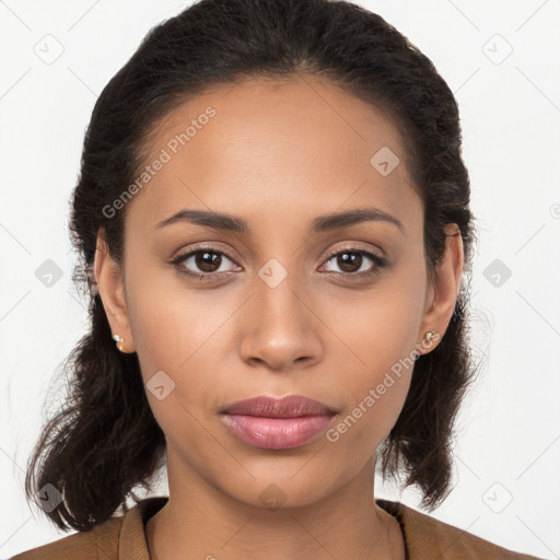 Joyful latino young-adult female with long  brown hair and brown eyes