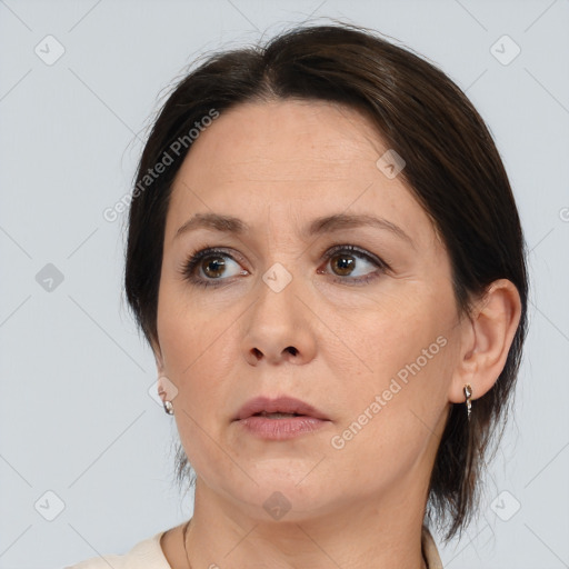 Neutral white adult female with medium  brown hair and brown eyes