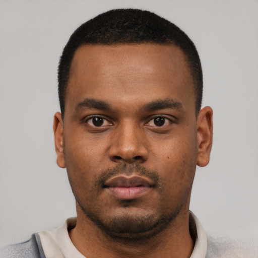 Neutral black young-adult male with short  black hair and brown eyes