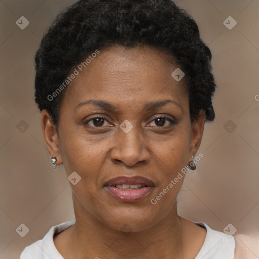 Joyful black adult female with short  brown hair and brown eyes