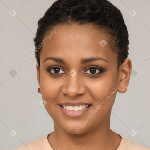 Joyful black young-adult female with short  brown hair and brown eyes