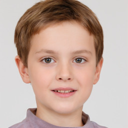 Joyful white child male with short  brown hair and brown eyes