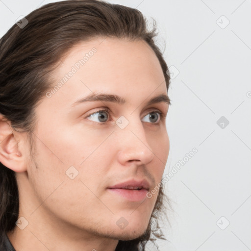 Neutral white young-adult male with medium  brown hair and grey eyes