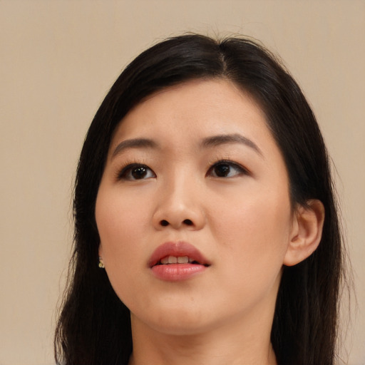 Neutral asian young-adult female with long  black hair and brown eyes