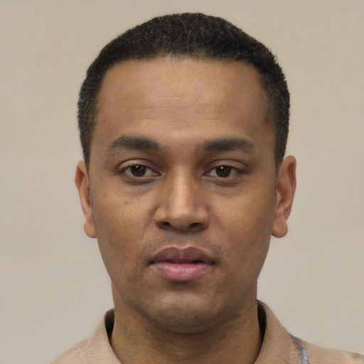 Neutral latino young-adult male with short  black hair and brown eyes