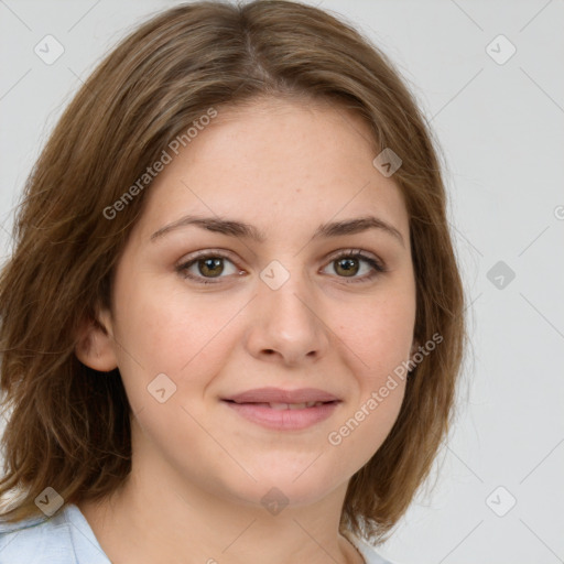 Joyful white young-adult female with medium  brown hair and green eyes