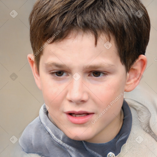 Joyful white child male with short  brown hair and brown eyes