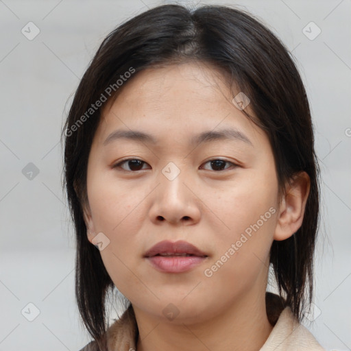 Neutral asian young-adult female with medium  brown hair and brown eyes