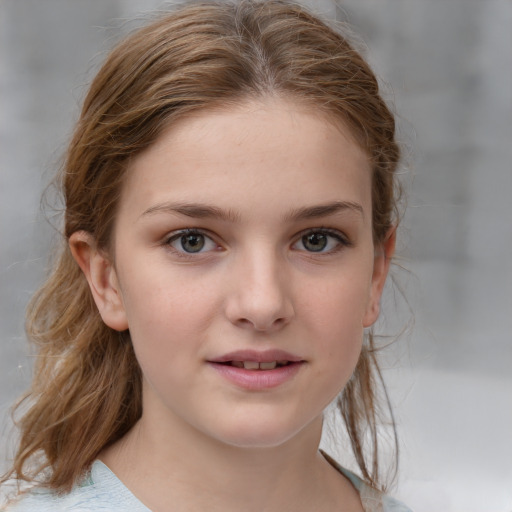 Joyful white child female with medium  brown hair and grey eyes