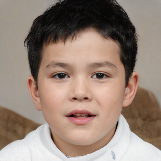 Joyful asian child male with short  brown hair and brown eyes