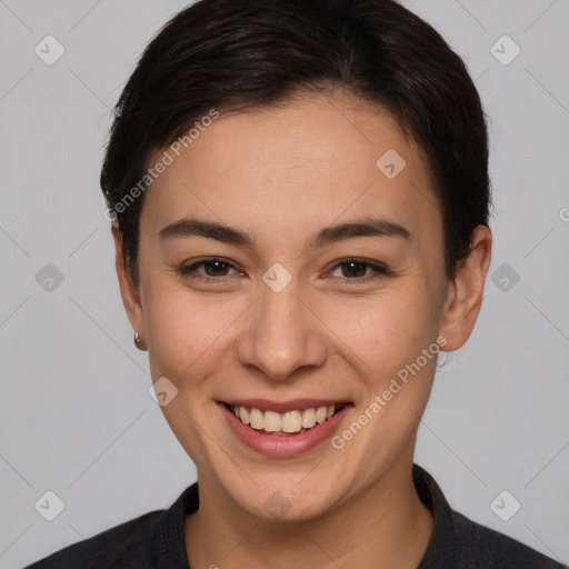 Joyful white young-adult female with short  brown hair and brown eyes