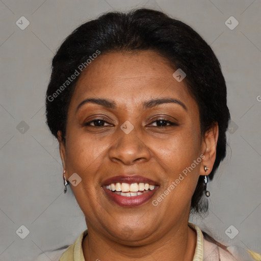 Joyful latino adult female with short  brown hair and brown eyes