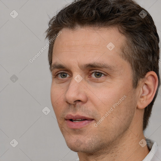 Neutral white adult male with short  brown hair and brown eyes