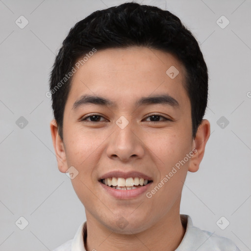 Joyful asian young-adult male with short  black hair and brown eyes