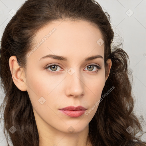 Neutral white young-adult female with long  brown hair and brown eyes