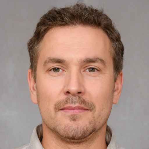 Neutral white adult male with short  brown hair and brown eyes