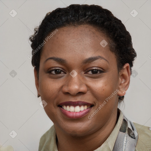 Joyful latino young-adult female with short  brown hair and brown eyes