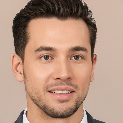 Joyful white young-adult male with short  brown hair and brown eyes