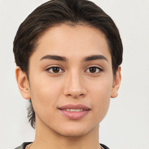 Joyful white young-adult female with short  brown hair and brown eyes