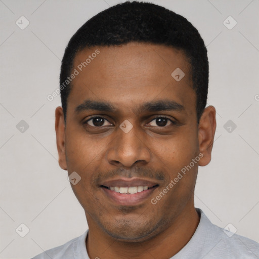 Joyful latino young-adult male with short  black hair and brown eyes