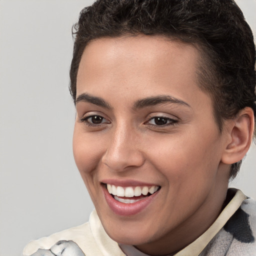 Joyful white young-adult female with short  brown hair and brown eyes