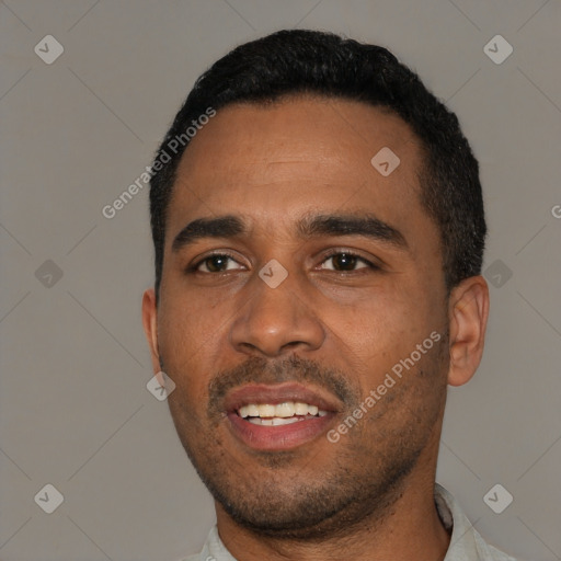 Joyful black young-adult male with short  black hair and brown eyes