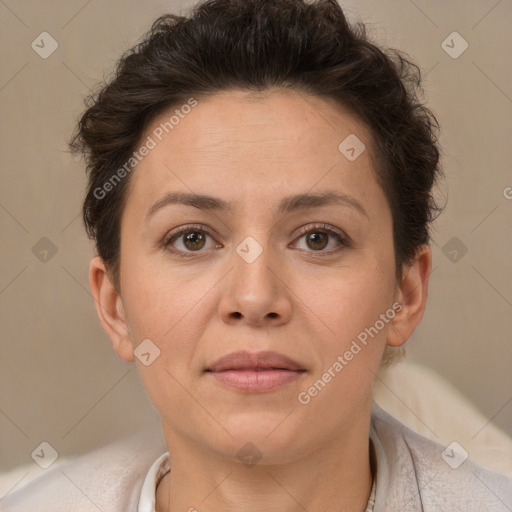 Joyful white adult female with short  brown hair and brown eyes