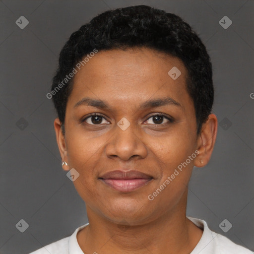 Joyful black young-adult female with short  black hair and brown eyes