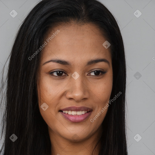 Joyful black young-adult female with long  brown hair and brown eyes