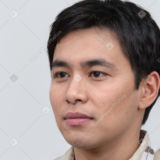 Neutral white young-adult male with short  black hair and brown eyes