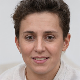 Joyful white adult female with short  brown hair and brown eyes