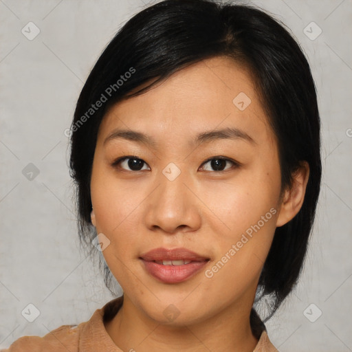 Joyful asian young-adult female with medium  black hair and brown eyes