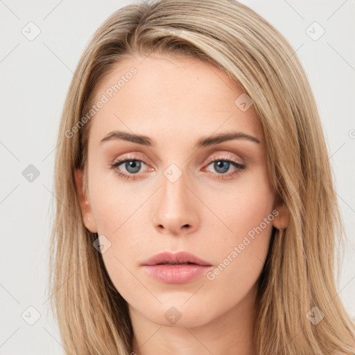 Neutral white young-adult female with long  brown hair and blue eyes