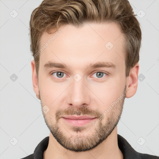 Neutral white young-adult male with short  brown hair and grey eyes