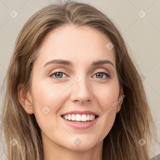 Joyful white young-adult female with long  brown hair and grey eyes