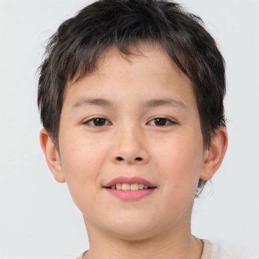 Joyful white child male with short  brown hair and brown eyes