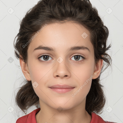 Joyful white child female with medium  brown hair and brown eyes