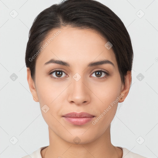 Joyful latino young-adult female with short  brown hair and brown eyes