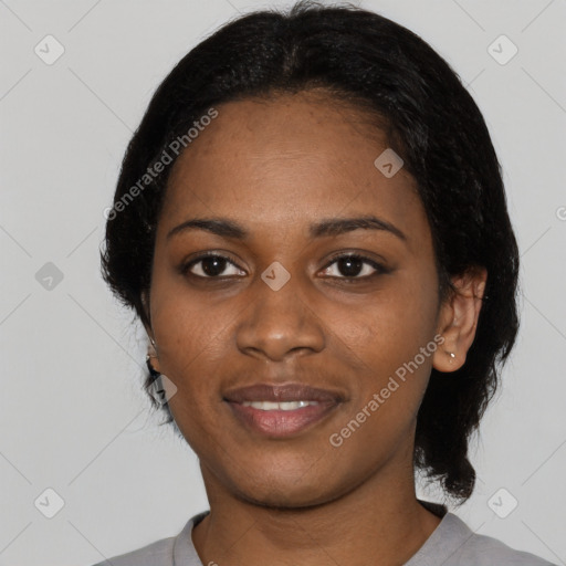 Joyful black young-adult female with medium  black hair and brown eyes