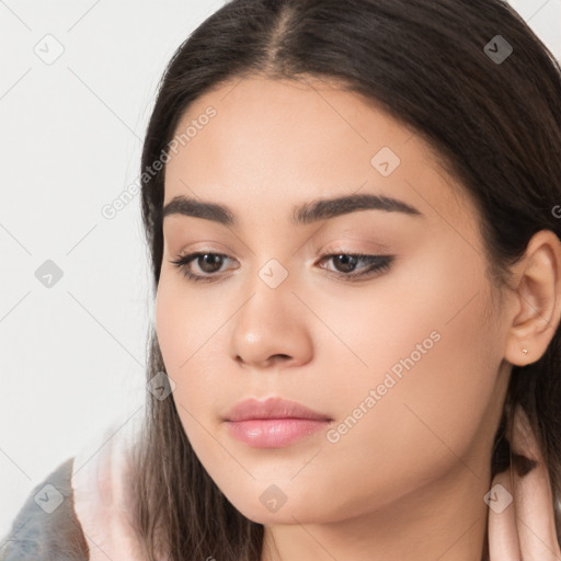 Neutral white young-adult female with long  brown hair and brown eyes