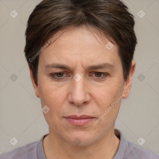 Joyful white adult female with short  brown hair and brown eyes