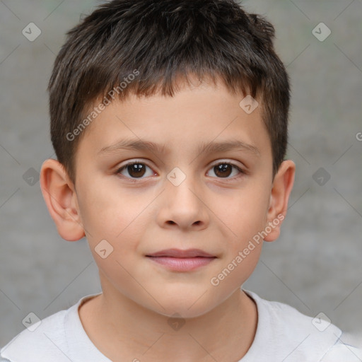 Joyful white child male with short  brown hair and brown eyes