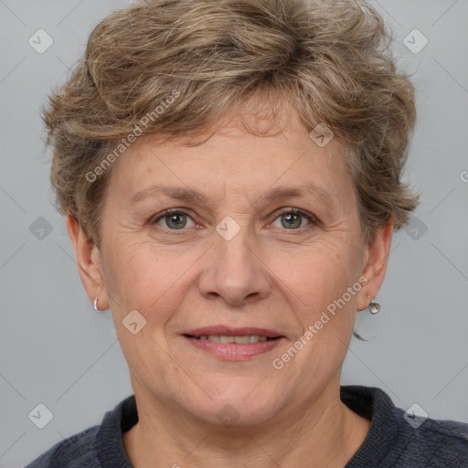 Joyful white middle-aged female with short  brown hair and grey eyes