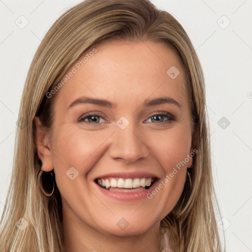 Joyful white young-adult female with long  brown hair and brown eyes