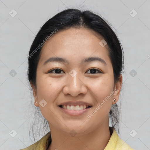 Joyful asian young-adult female with medium  brown hair and brown eyes