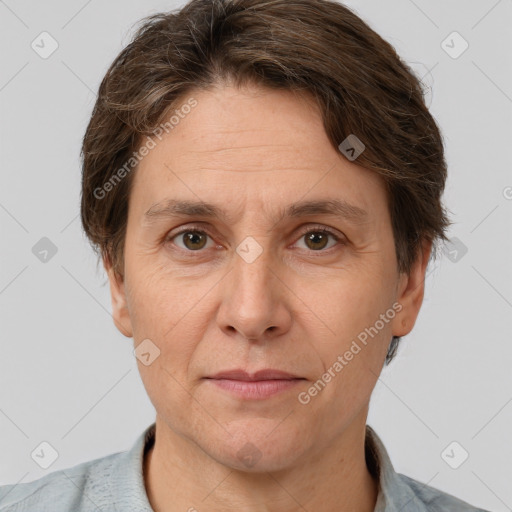 Joyful white adult female with short  brown hair and brown eyes