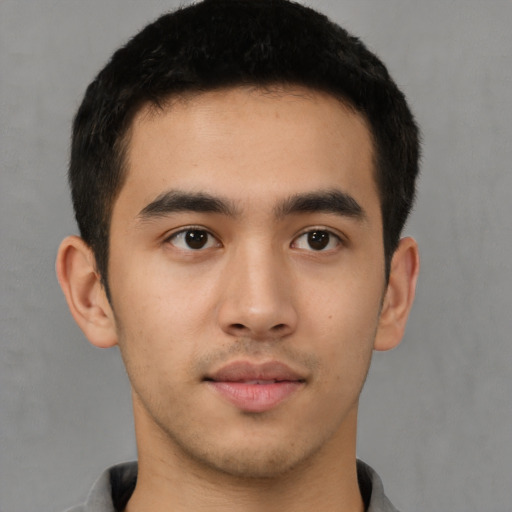Neutral white young-adult male with short  black hair and brown eyes